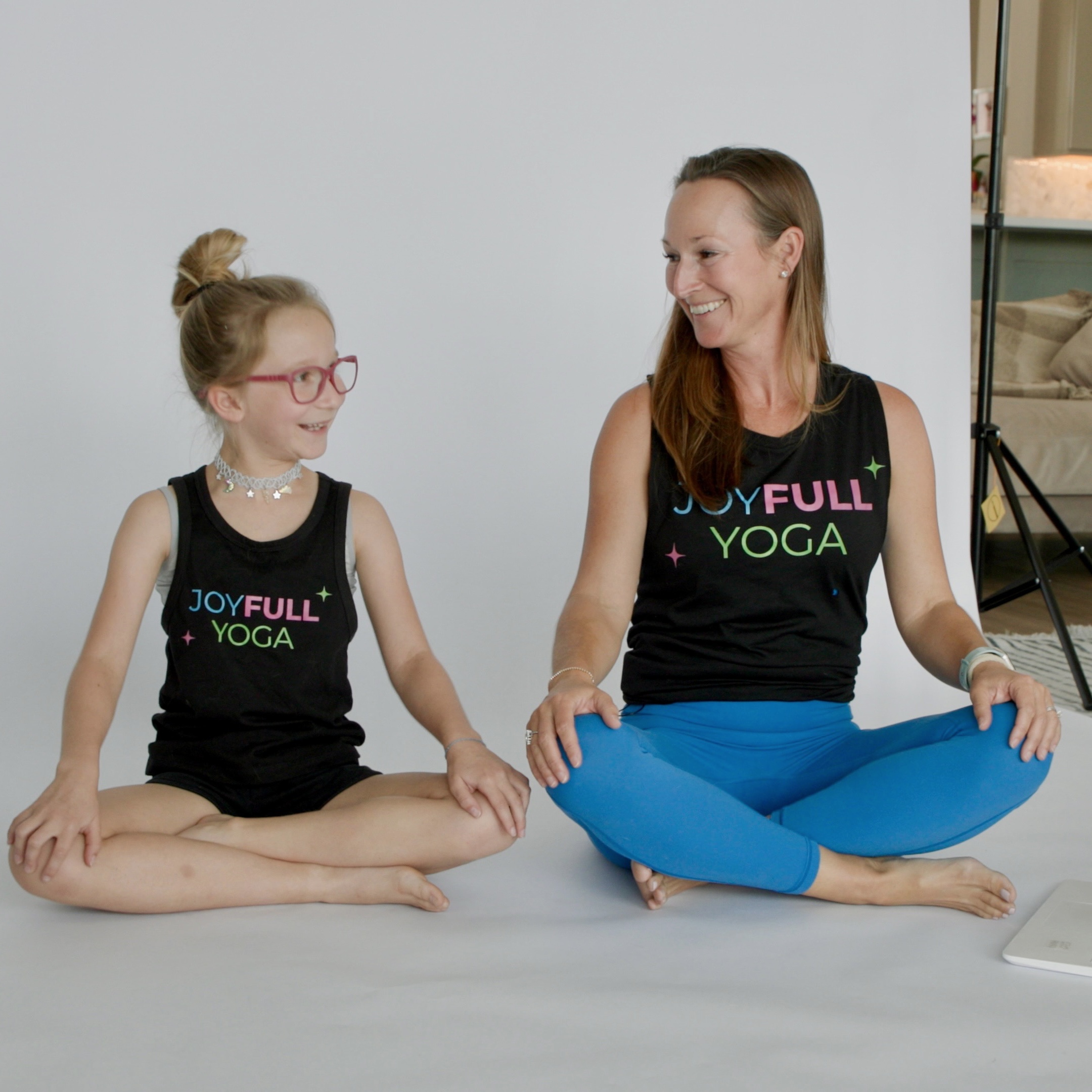 Chelsea smiling at outdoor yoga session
