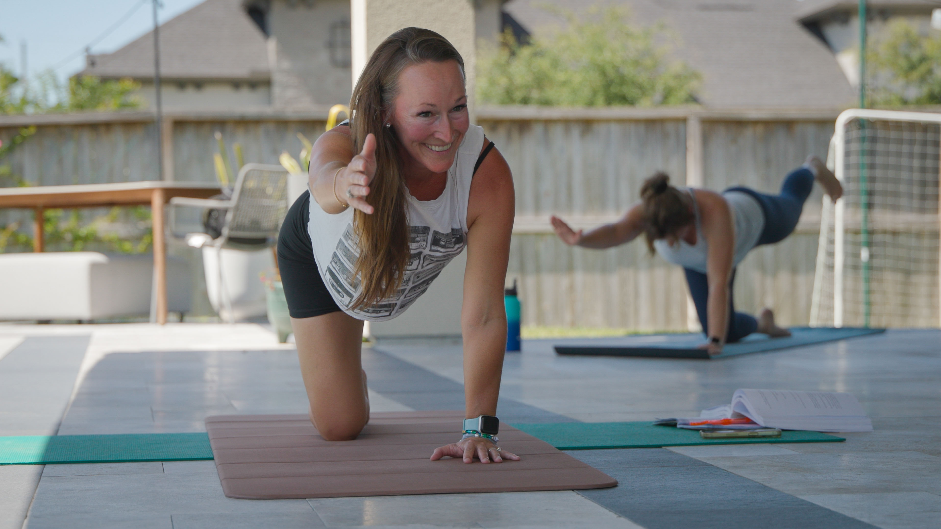 Chelsea demonstrating a yoga pose